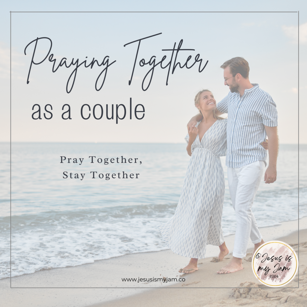 Christian couple praying together on the beach